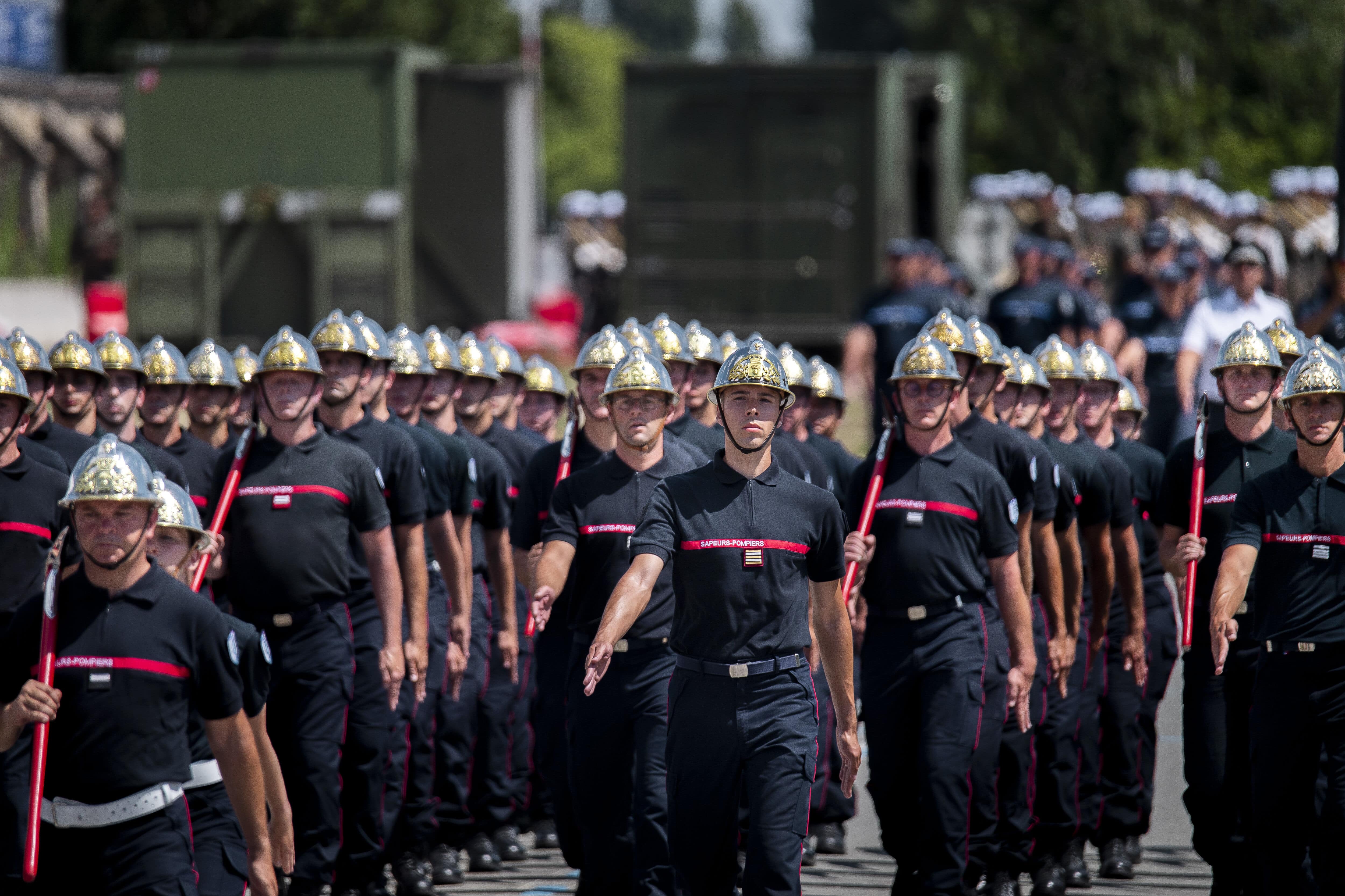 Les sapeurs-pompiers volontaires de France défilent
lors des répétitions du 14 juillet 2022.